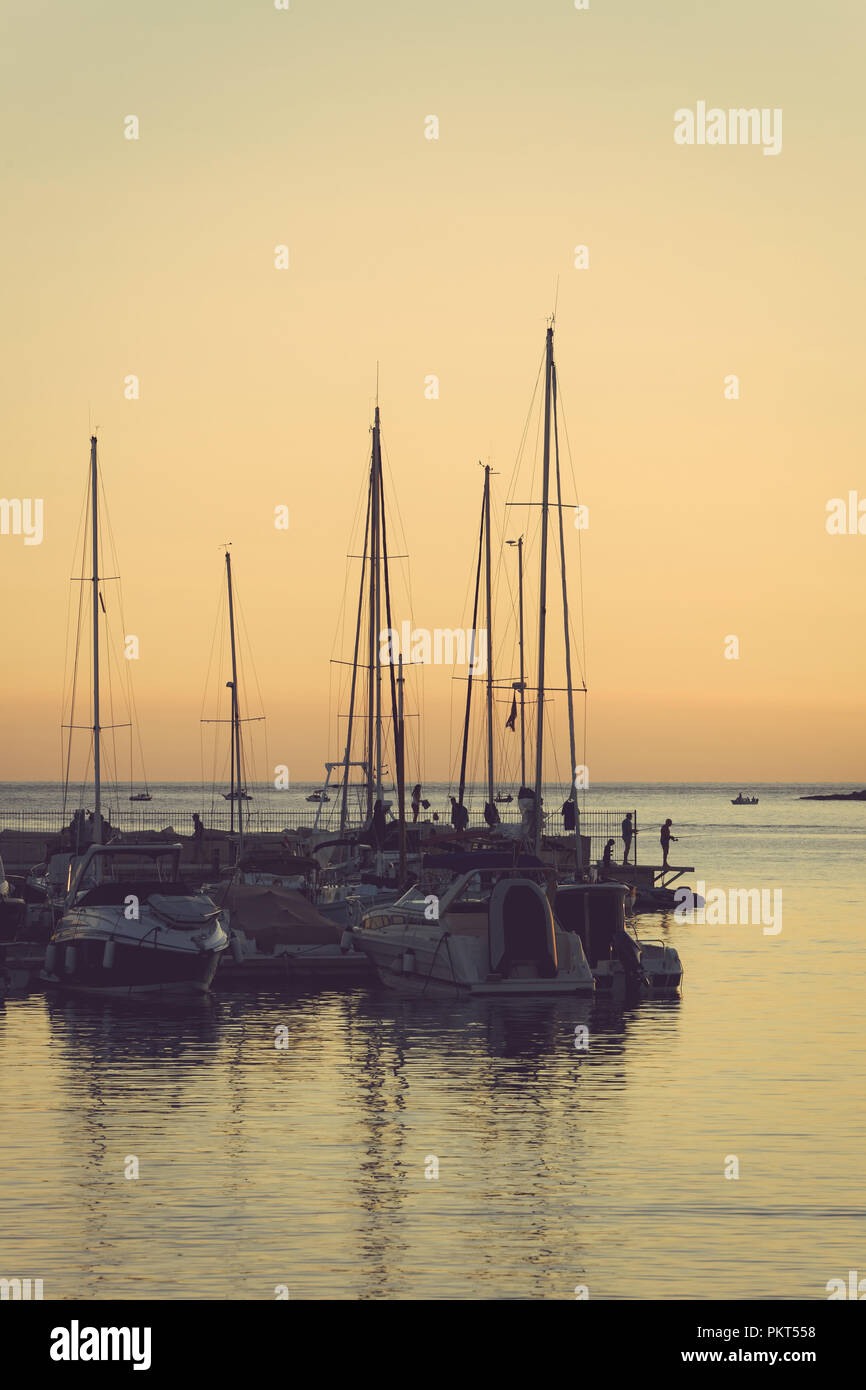 Boats in Marina in Adriatic Sea in Pula, Croatia. At sunset Stock Photo