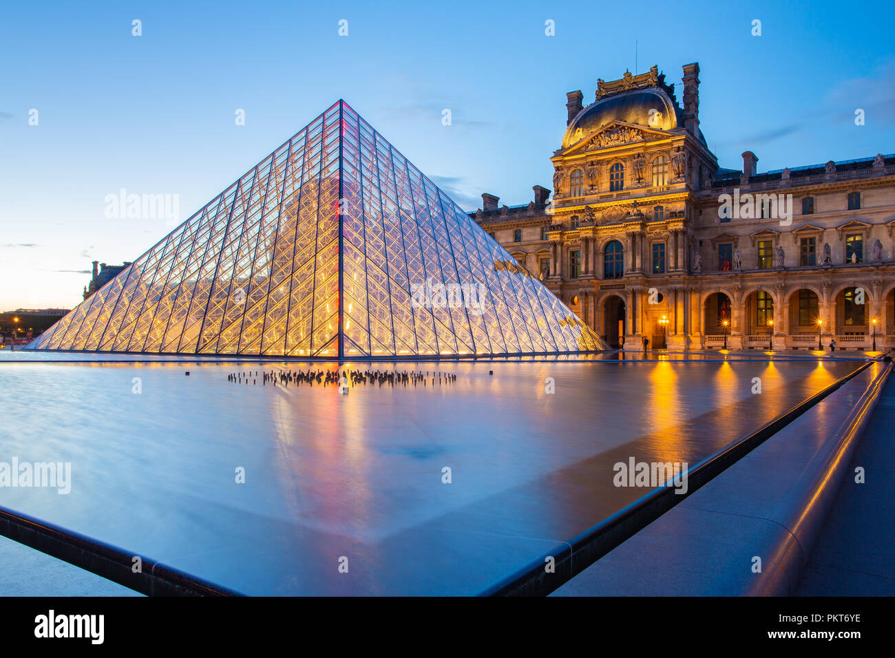 Paris, France - May 13, 2014: Louvre Museum at night landmark in Paris city, France. Stock Photo
