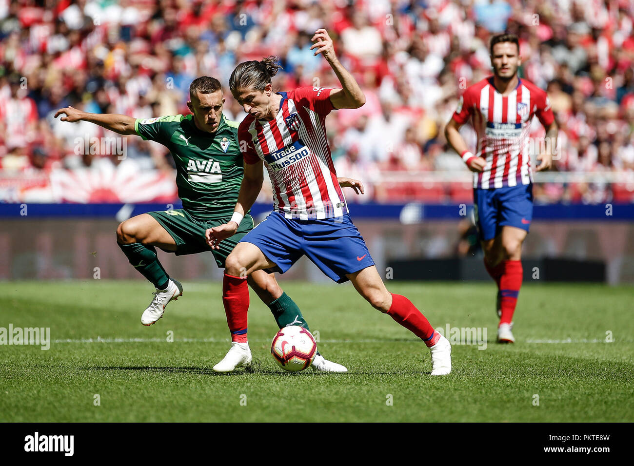 Wanda Metropolitano, Madrid, Spain. 15th Sep, 2018. La Liga football, Atletico Madrid versus Eibar; Filipe Luis Kasmirski (Atletico de Madrid) challenges for control of the ball with De Blasis (SD Eibar) Credit: Action Plus Sports/Alamy Live News Stock Photo