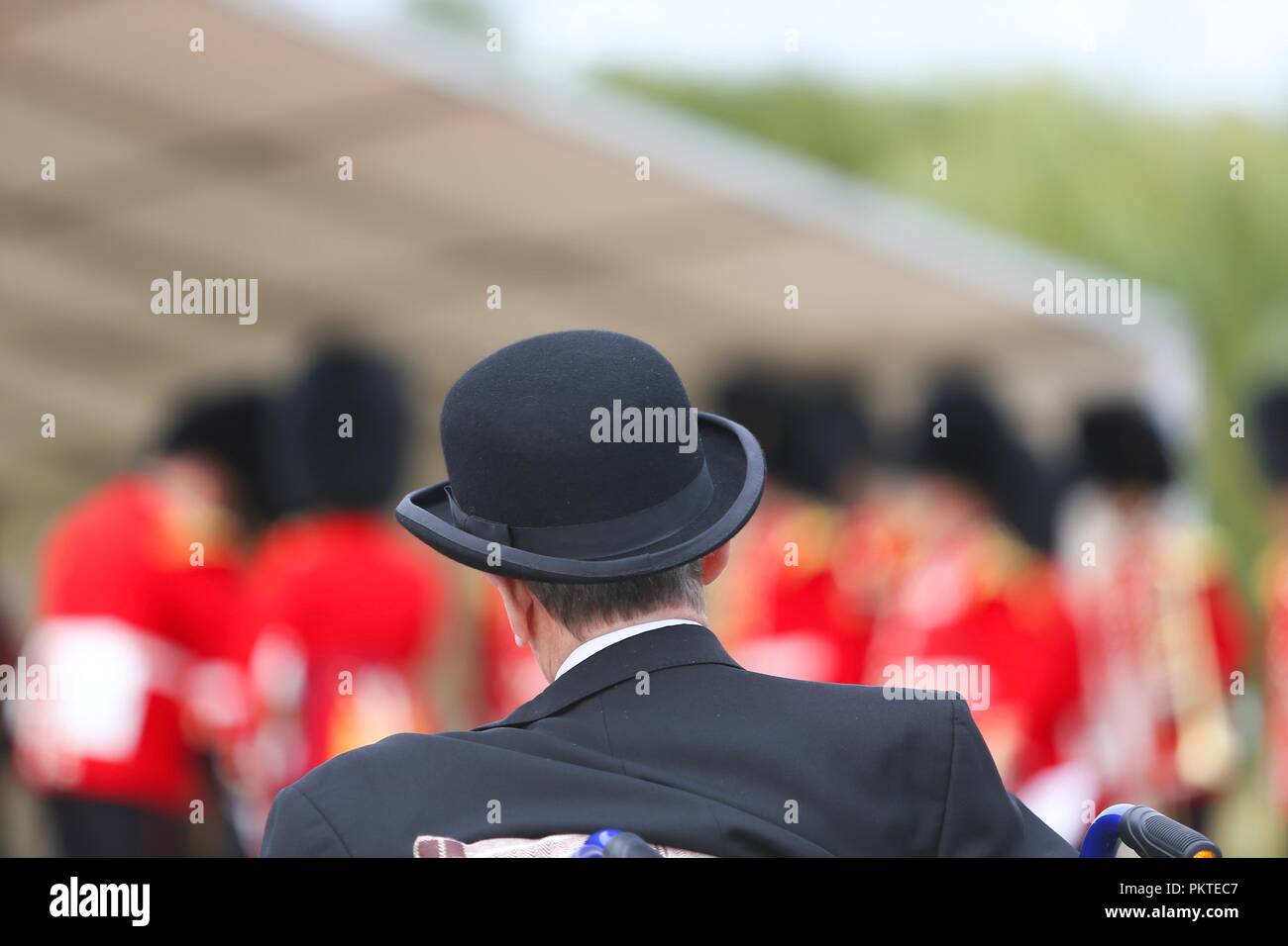 Worcester, Worcestershire, UK. 15th September 2018. An ex-serviceman wears a bowler hat at the Drumhead Service at Gheluvelt Park, Worcester. Peter Lopeman/Alamy Live News Stock Photo
