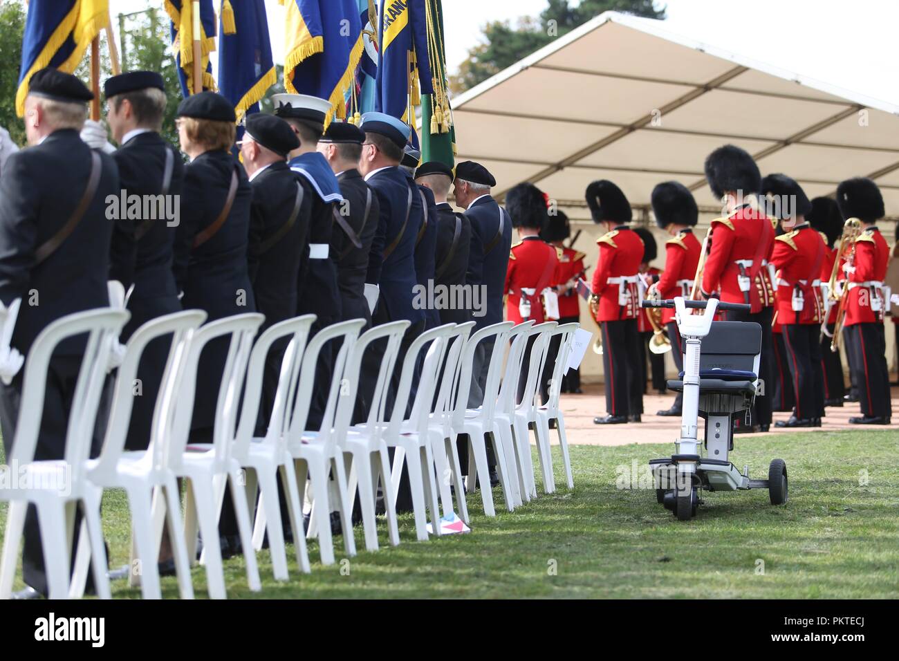 Worcester, Worcestershire, UK. 15th September 2018. A mobility scooter is placed behind elderly ex-servicemen at the Drumhead Service at Gheluvelt Park, Worcester. Peter Lopeman/Alamy Live News Stock Photo