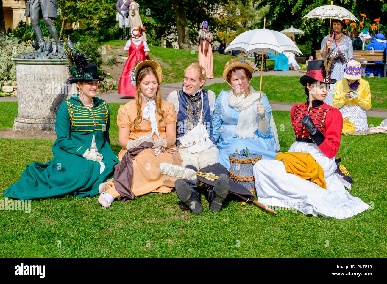 Bath, UK. 15th Sep, 2018. Jane Austen fans taking part in the world famous Grand Regency Costumed Promenade are pictured in Parade Gardens. The Promenade, part of the Jane Austen Festival is a procession through the streets of Bath and the participants who come from all over the world dress in 18th Century costume. Credit:  Lynchpics/Alamy Live News Stock Photo