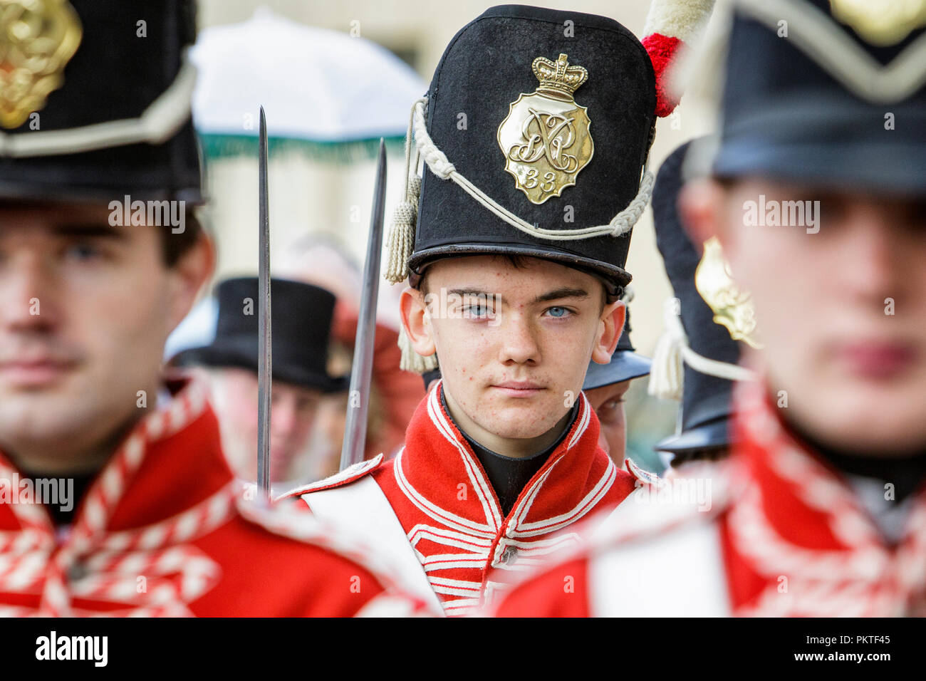 Bath, UK. 15th Sep, 2018. Members of the 33rd Regiment Of Foot are pictured taking part in the world famous Grand Regency Costumed Promenade. The Promenade, part of the Jane Austen Festival is a procession through the streets of Bath and the participants who come from all over the world dress in 18th Century costume. Credit:  Lynchpics/Alamy Live News Stock Photo