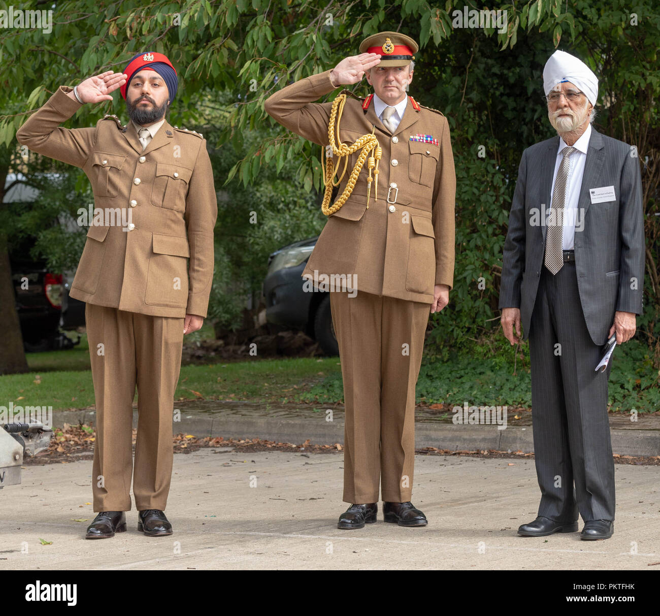 London 15th September 2018 UK Army open day to mark annual Saragarhi Commemorations This celebrates an epic battle where 21 Sikh soldiers took a last stand against 10,000 enemy tribesmen in 1897  Captain J Singh-Sohal,(left) and Major General Ben Bathurst CBE Officer Commanding London District, salute as last post is played at the event Credit Ian Davidson/Alamy Live News Stock Photo