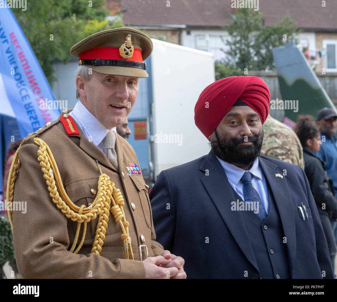 London 15th September 2018 UK Army open day to mark annual Saragarhi Commemorations This celebrates an epic battle where 21 Sikh soldiers took a last stand against 10,000 enemy tribesmen in 1897  Major General Ben Bathurst CBE General officer commanding London District, talks to some local sikhs at the event Credit Ian Davidson/Alamy Live News Stock Photo