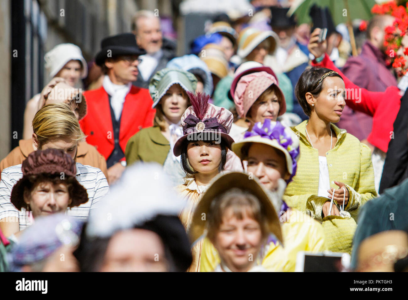 Bath, UK. 15th Sep, 2018. Jane Austen fans taking part in the world famous Grand Regency Costumed Promenade are pictured as they enter Parade Gardens. The Promenade, part of the Jane Austen Festival is a procession through the streets of Bath and the participants who come from all over the world dress in 18th Century costume. Credit:  Lynchpics/Alamy Live News Stock Photo