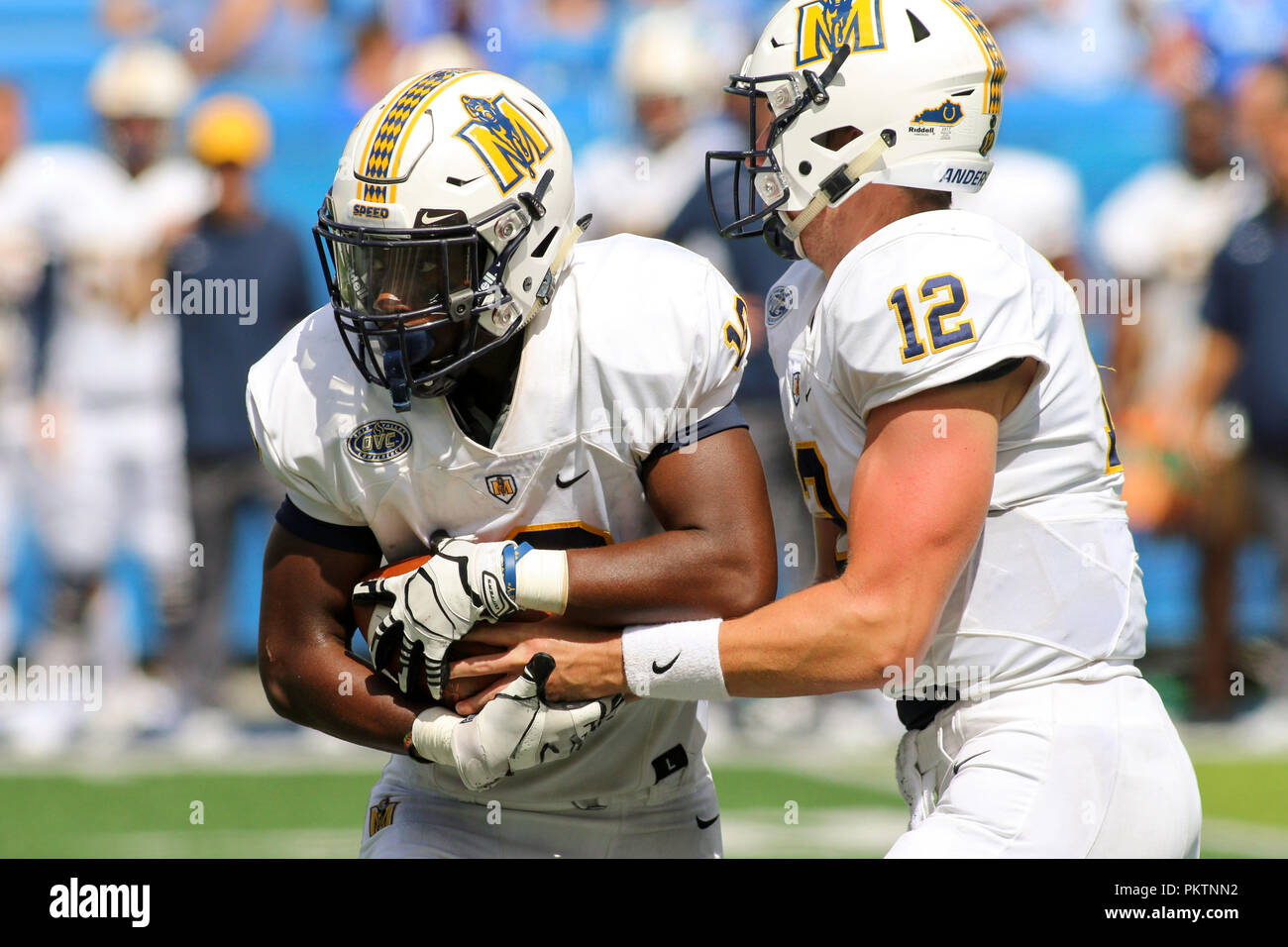 Lexington, Kentucky, USA. 15th Sep, 2018. Murray State Racers Rodney Castille (left) takes a handoff from Drew Anderson (right) during an NCAA football game between the Kentucky Wildcats and the Murray State Racers at Kroger Field in Lexington, Kentucky. Kevin Schultz/CSM/Alamy Live News Stock Photo