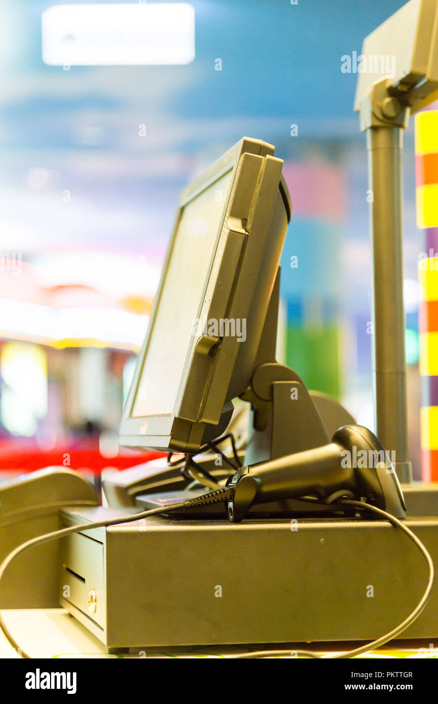 Electronic point of sale machine with colorful background Stock Photo