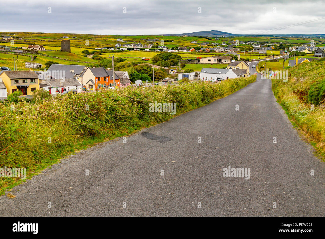 Doolin village with houses and farm fields, Clare, Ireland Stock Photo