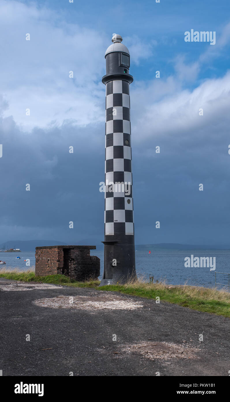 The old West Quey Beacon Light house sits on the west Quey of Port Glasgow Stock Photo