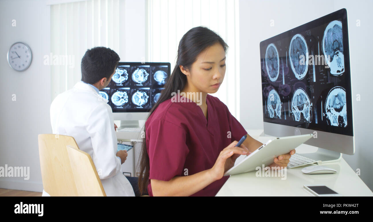 Multi-ethnic medical team working in the office Stock Photo
