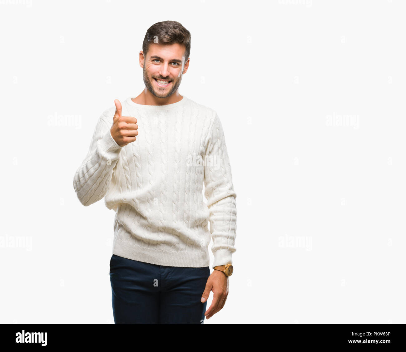 Young handsome man wearing winter sweater over isolated background ...