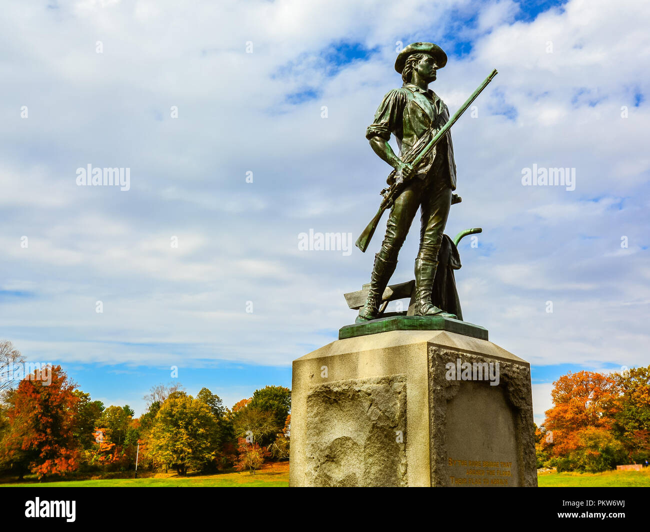 Concord, MA - Minuteman Statue by the Old North Bridge. The statue depicts a farmer becoming a soldier to fight in the Revolutionary War. Stock Photo