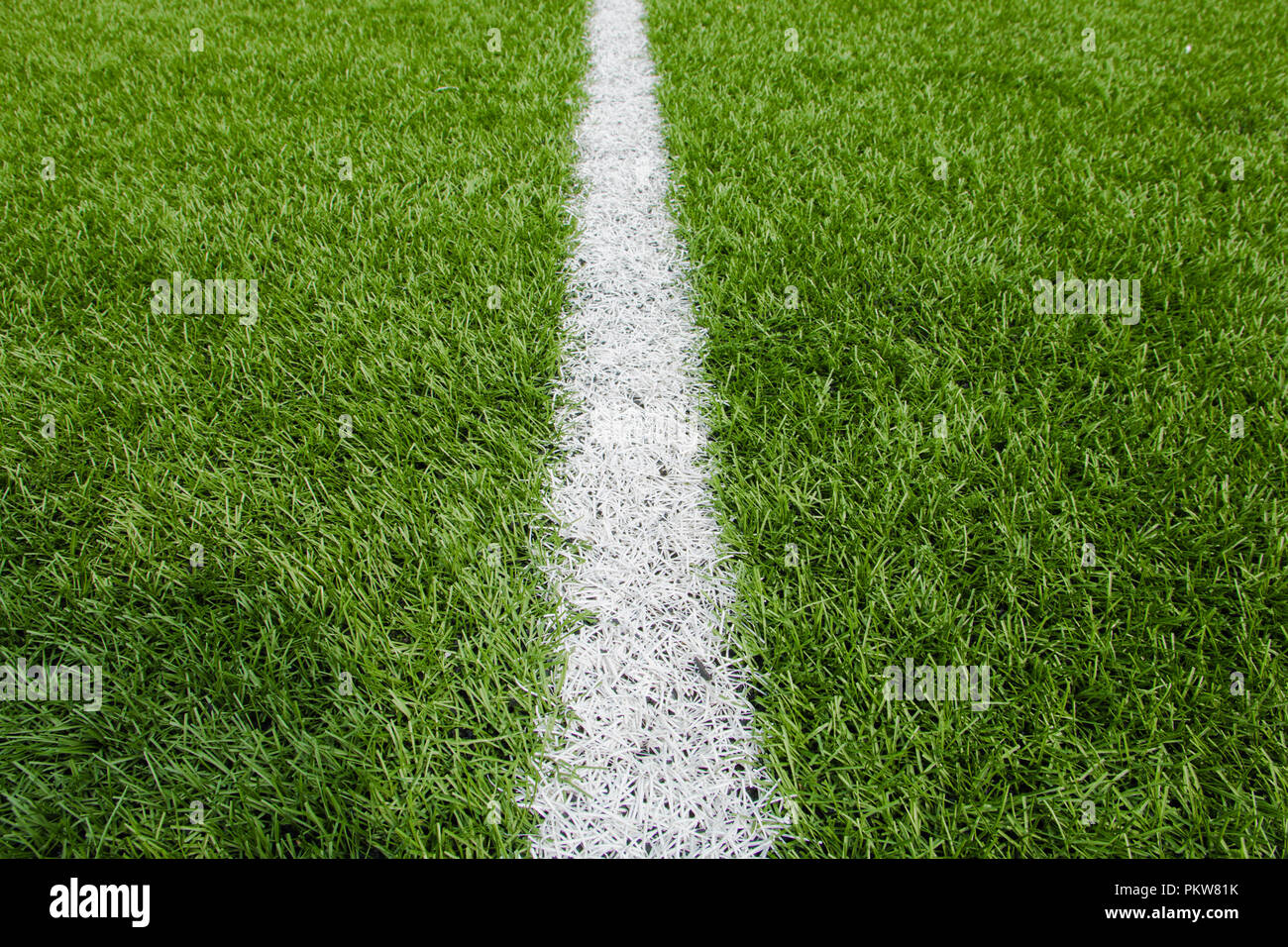 Green Football Background With A Vertical Line Stock Photo Alamy