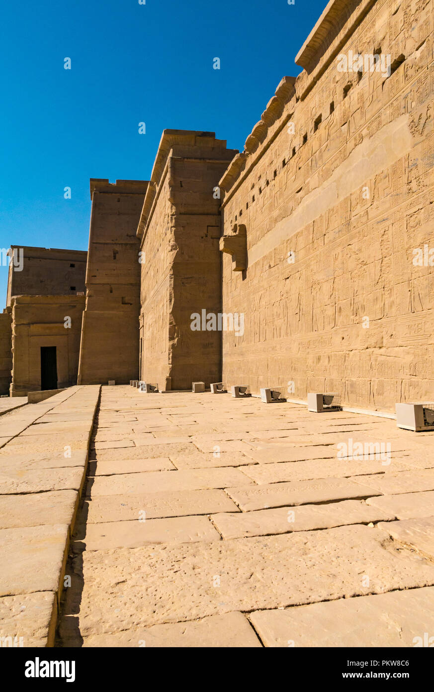 Long outer  pylonwall, Temple of Philae, Agilkia Island, River Nile, Aswan, Egypt, Africa Stock Photo