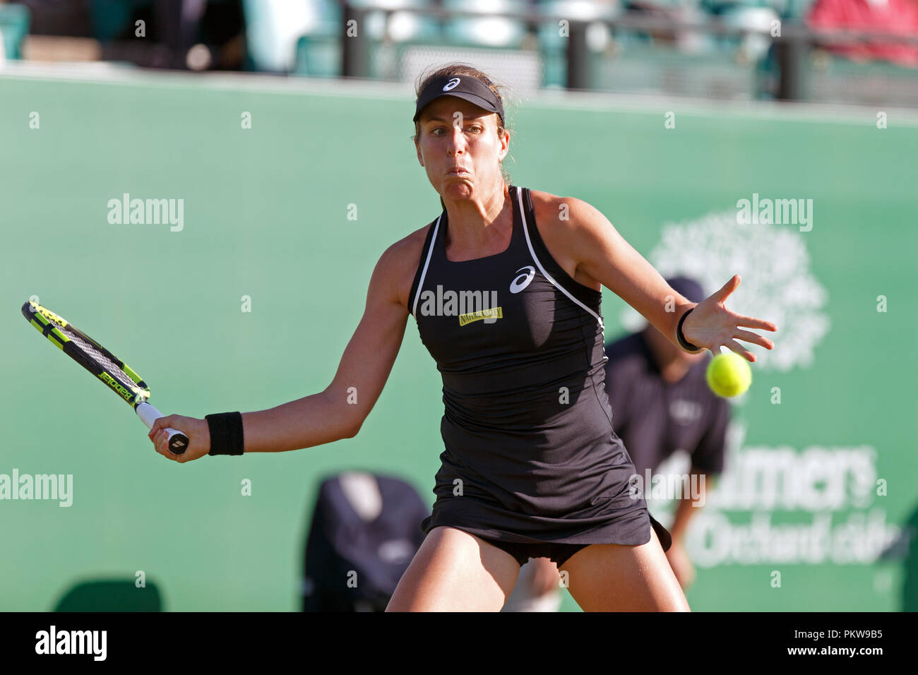 British tennis player Johanna Konta (Jo Konta) playing a forehand shot during a professional singles match in 2018. Stock Photo