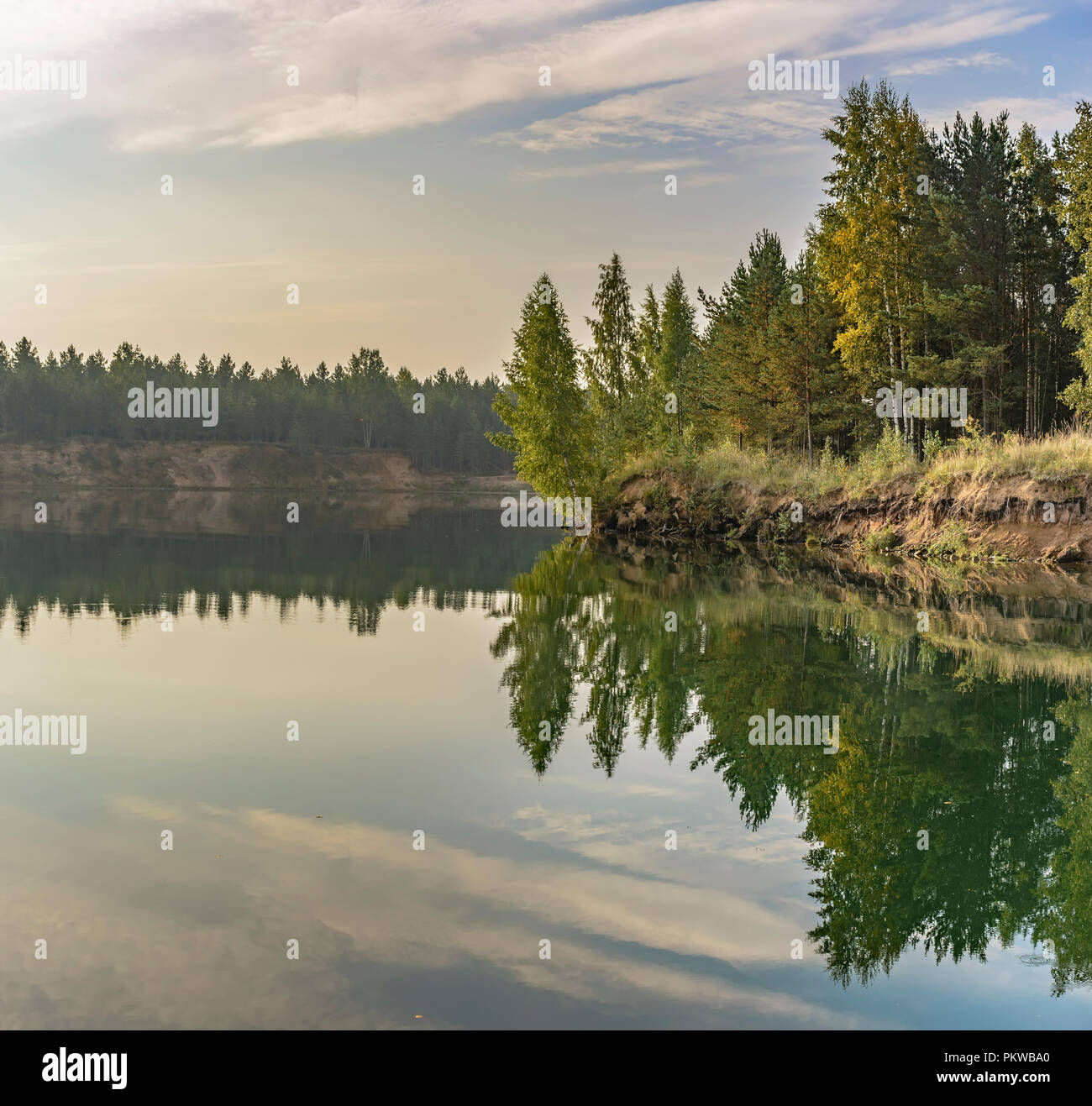 Artificial lake formed after the removal of sand. Closed sand quarry