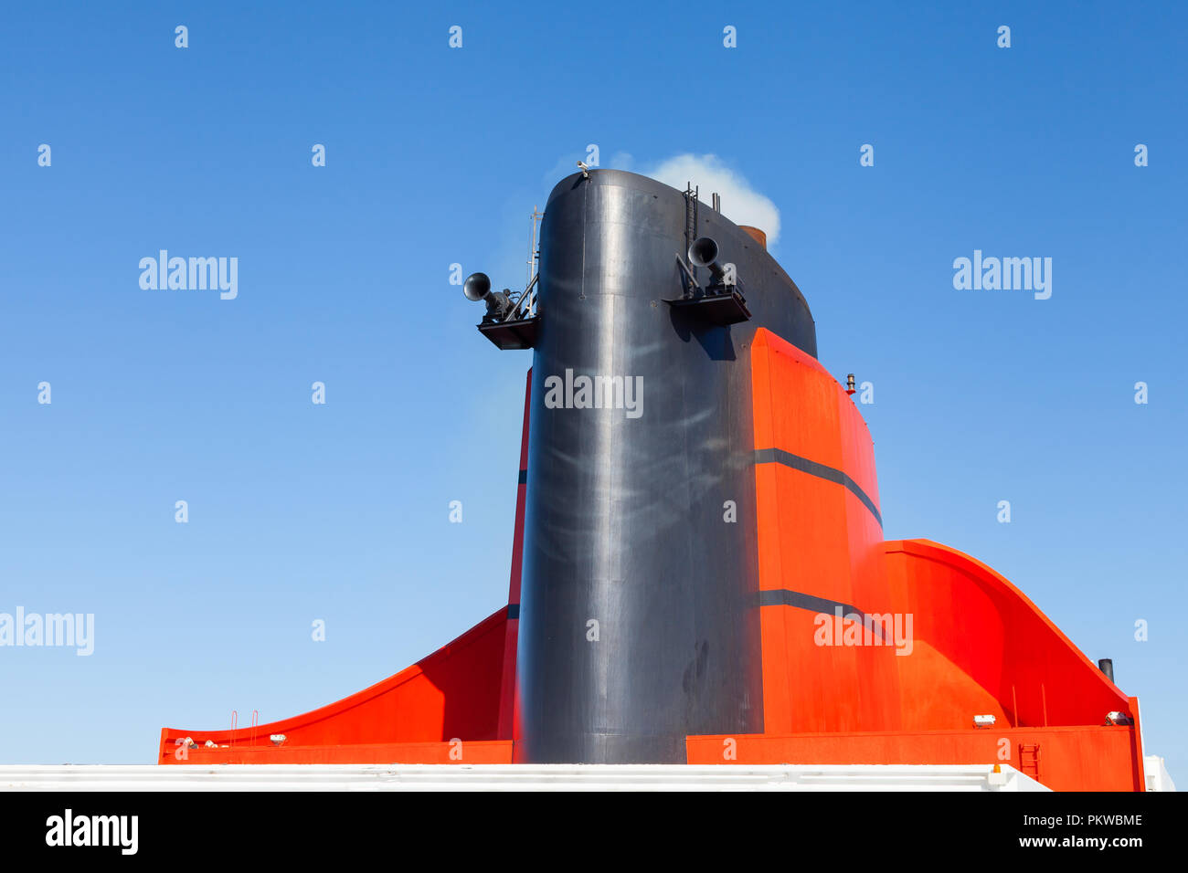 The funnel of the Cunard cruise liner Queen Mary 2 is pictured in the North Atlantic Ocean.  Cunard Line is part of the Carnival Corporation. Stock Photo