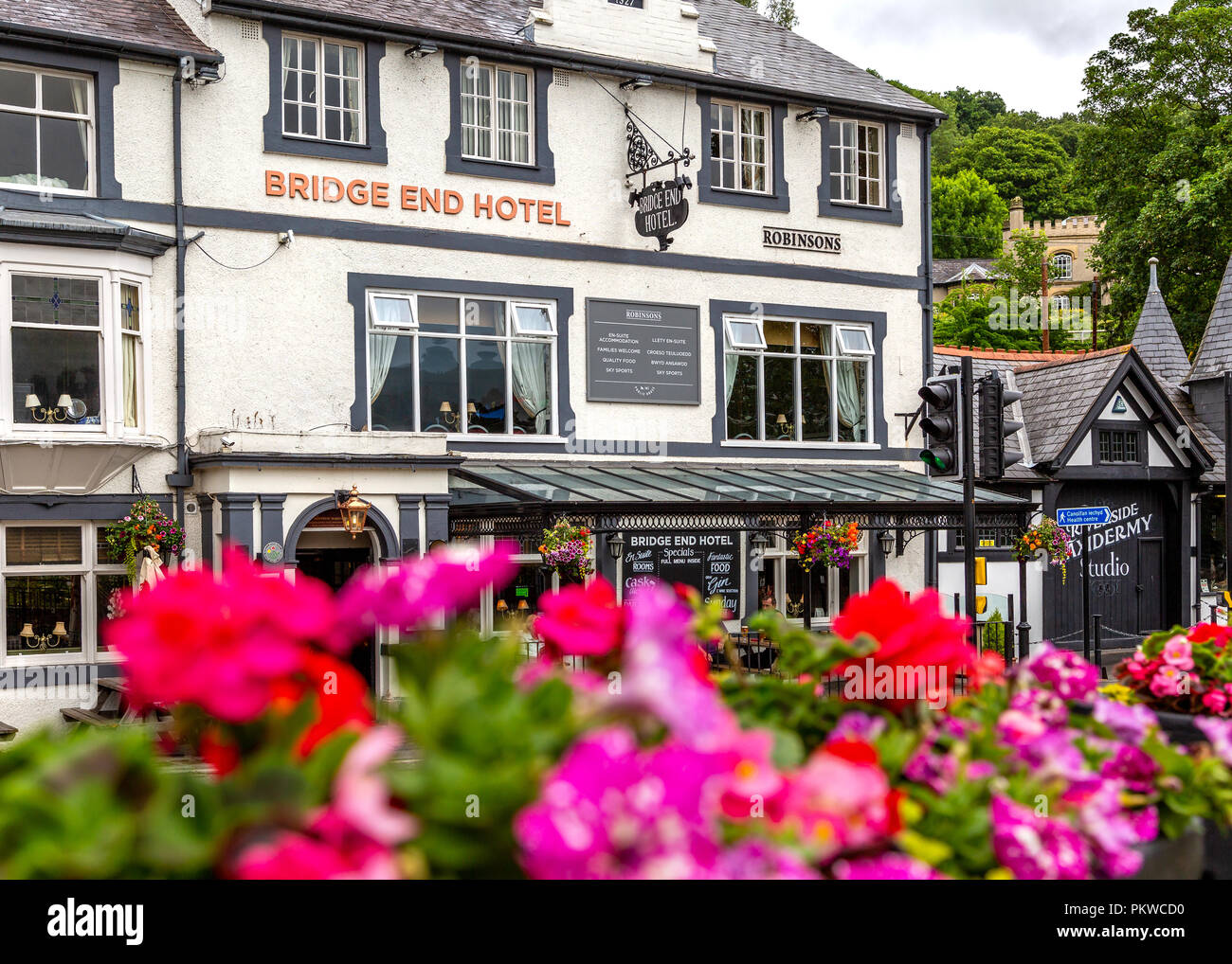 Llangollen hotel with flowers in the foreground. Stock Photo