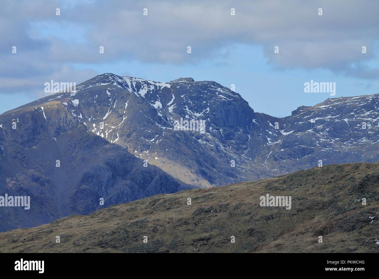UK, Coniston Cumbria. View towards the distant Scafell mountain range