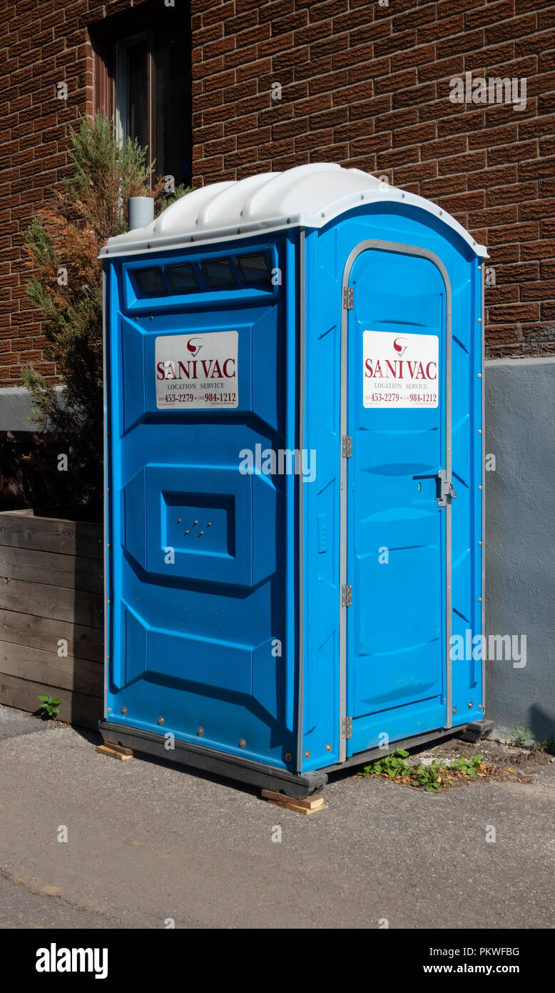 Sanivac portable toilet on a street in Montreal, QC, Canada Stock Photo