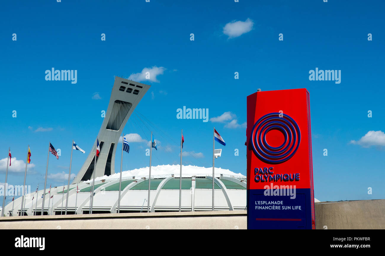Olympic Park sign at the Montreal Tower and the Montreal Olympic Stadium in QC, Canada Stock Photo