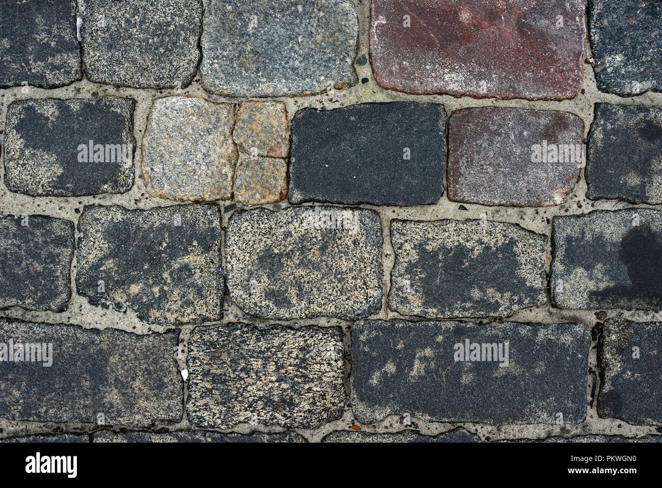 old cobblestone road for background or texture Stock Photo - Alamy