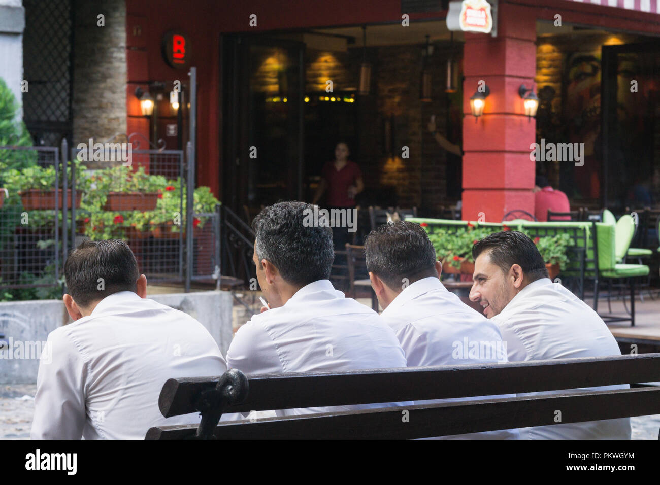 Belgrade Skadarlija street scene - restaurant musicians taking a short break. Serbia. Stock Photo