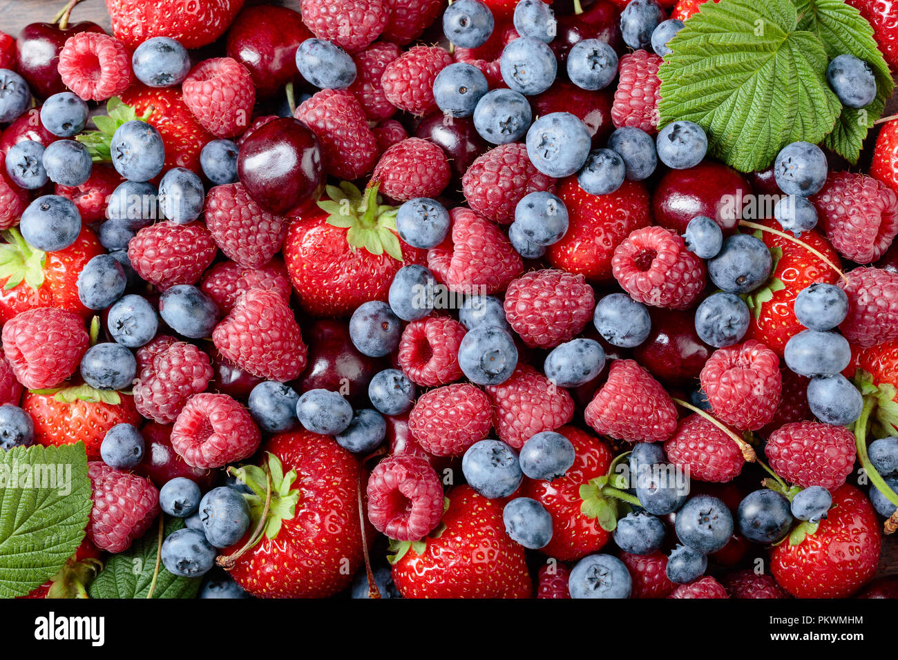 Berries closeup colorful assorted mix of strawberry, blueberry ...