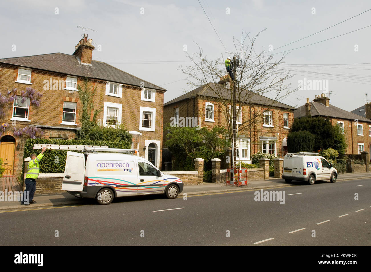 Two BT workmen on Clarence Road in Windsor, Berkshire, England 2007 Stock Photo