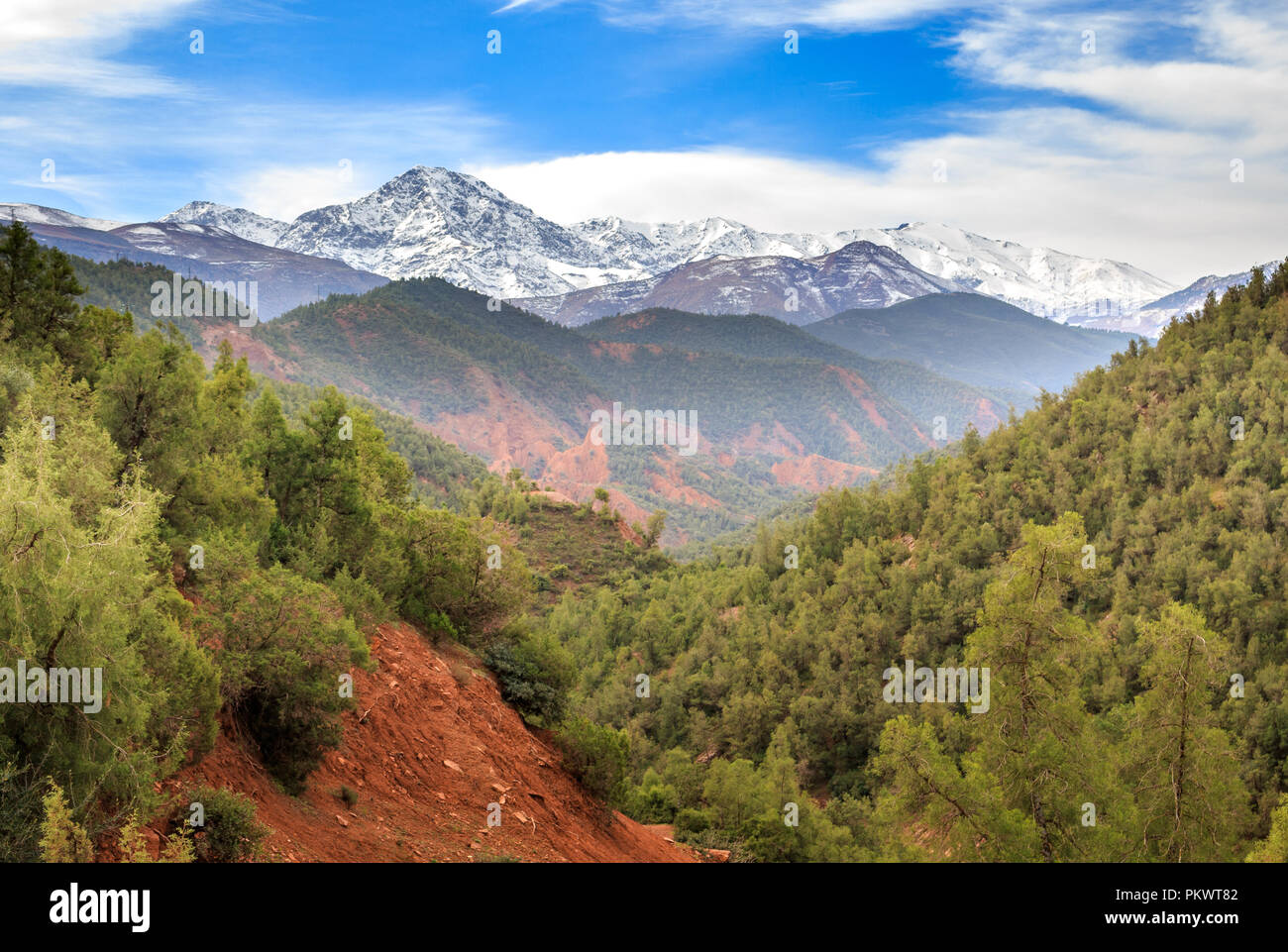 colorful panoramic view of High Atlas mountains in Morocco with snowy Peaks in the background Stock Photo
