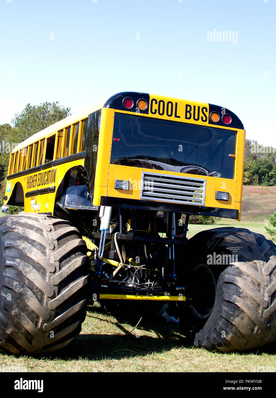 Gigantic tires on transformed school bus made into monster vehicle for