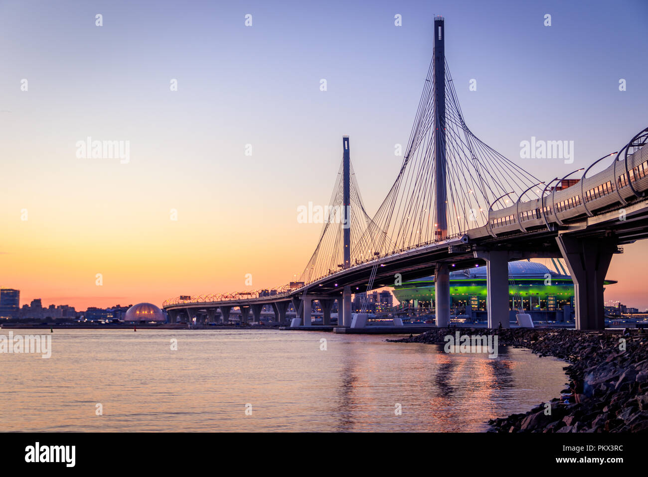 WHSD bridge in St. Petersburg in the evening at sunset. High-speed bypass toll road. Russia, Saint-Petersburg. Petersburg bridges. New modern bridge.  Stock Photo