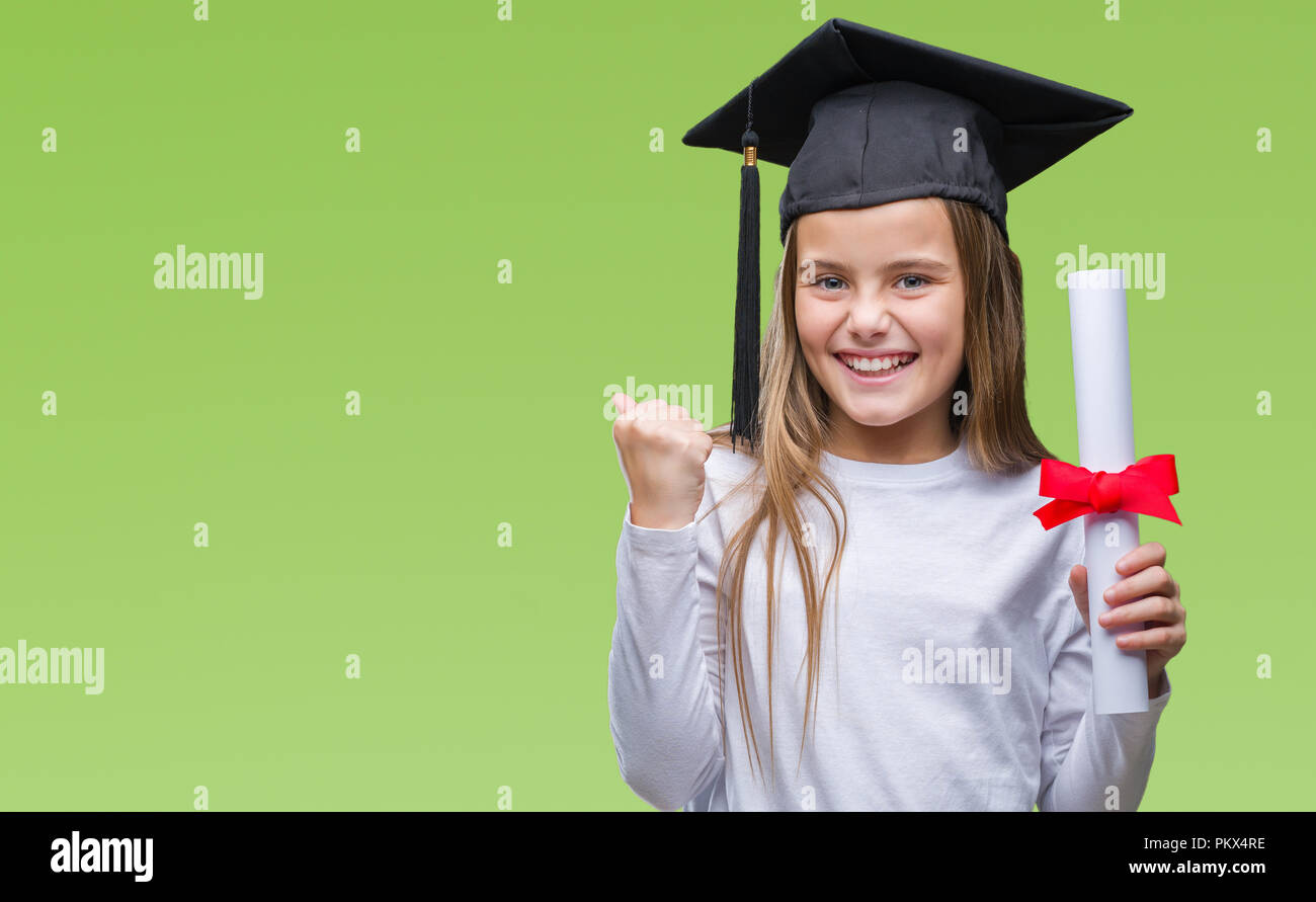 Graduatech Young beautiful girl wearing graduate cap holding degree over isolated ...