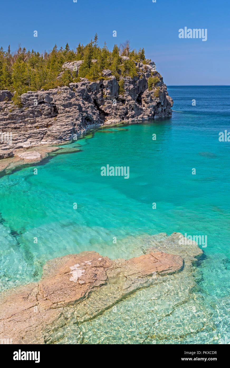 Colorful and Calm Indian Cove along the Great Lakes on Lake Huron in Bruce Peninsula National Park in Ontario Stock Photo