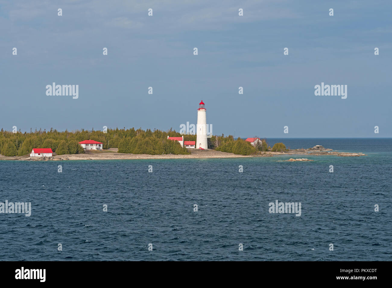 Colorful Cove Island Lighthouse in Lake Huron near Tobermary, Ontario, Canada Stock Photo