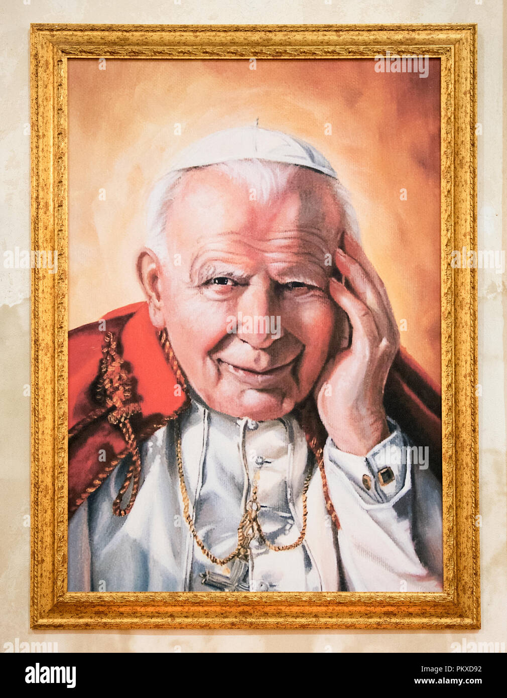 Portrait of Pop Giovanni Paolo II in a gold frame, the Bishop of Rome and Supreme Pontiff of the Catholic Church and Vatican Stock Photo