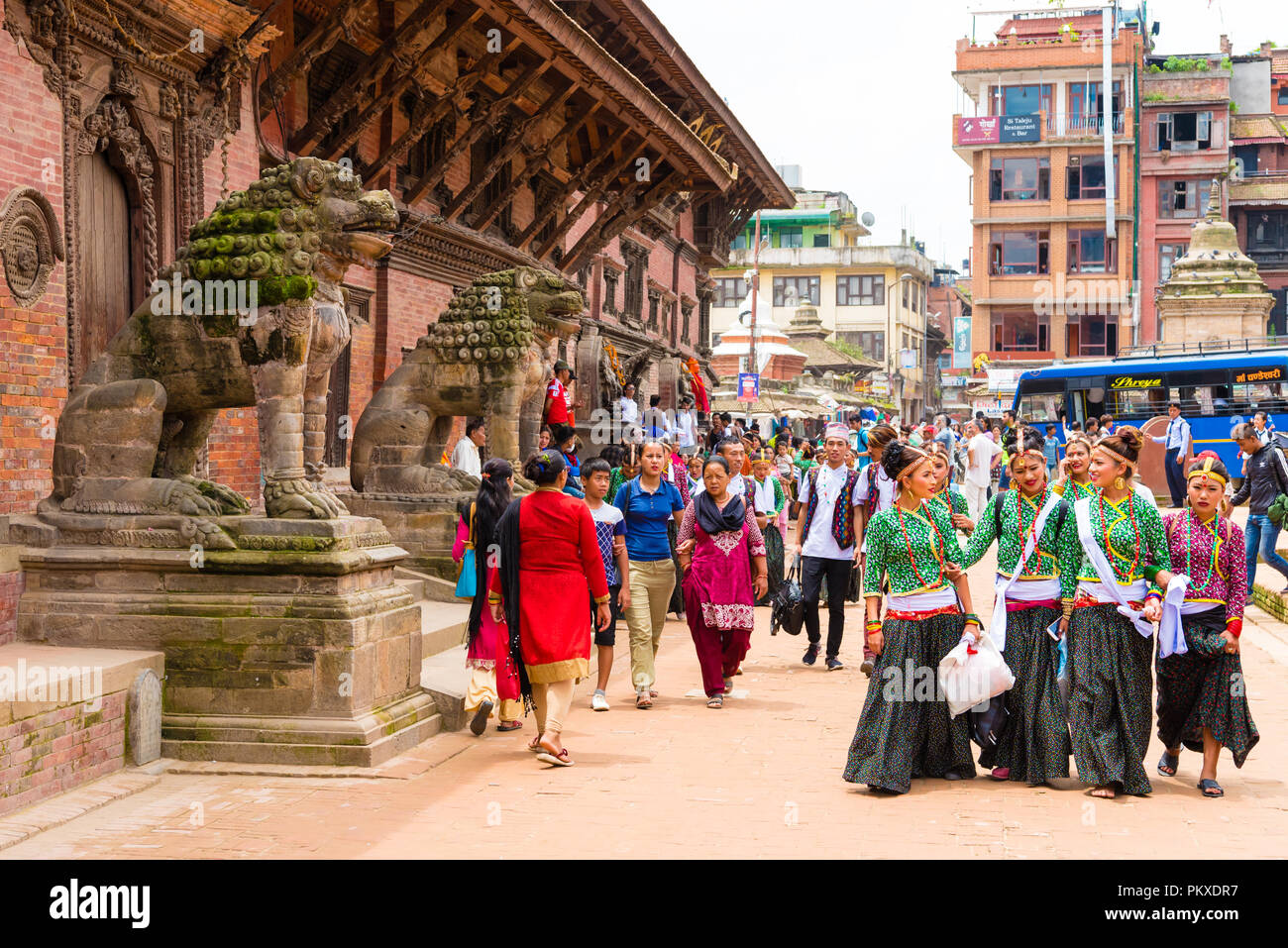 Patan, Lalitpur, Nepal - July 17, 2018 : Group of dancers wearing traditional costumes in Patan Durbar Square, UNESCO World Heritage Site Stock Photo
