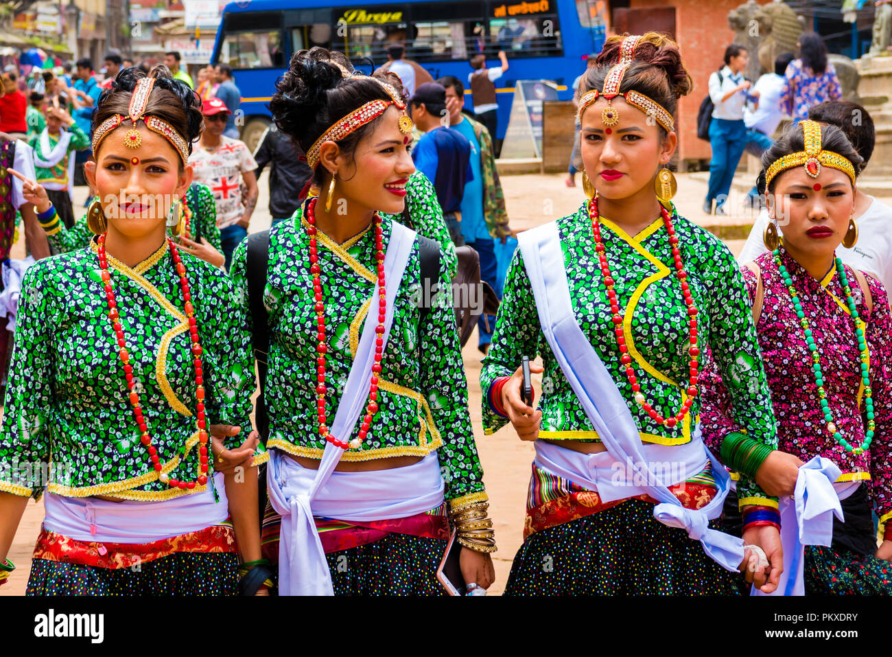 Patan, Lalitpur, Nepal - July 17, 2018 : Group of dancers wearing traditional costumes in Patan Durbar Square, UNESCO World Heritage Site Stock Photo