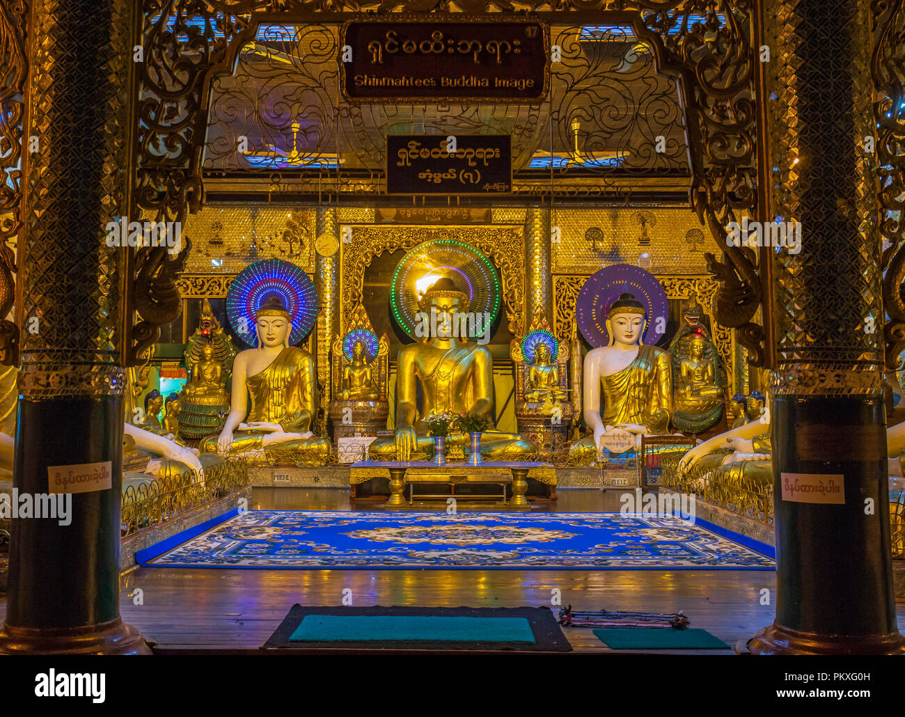 Golden buddha prayer room in hires stock photography and images Alamy