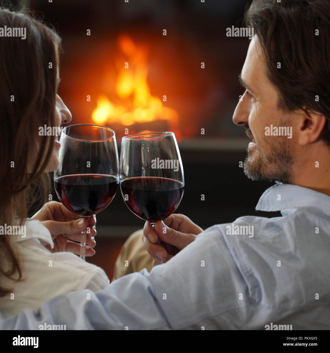 Romantic Couple Drinking Wine At Home Near Fireplace Stock Photo Alamy romantic-couple-drinking-wine-at-home-near-fireplace-stock-photo-alamy