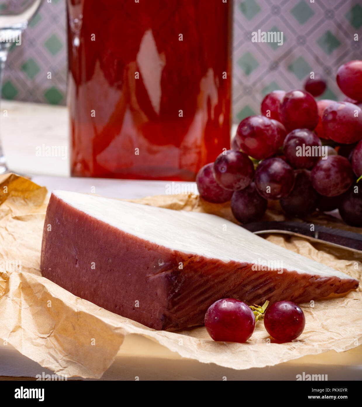 Traditional Spanish cheese, one piece of Murcian wine cheese from goat