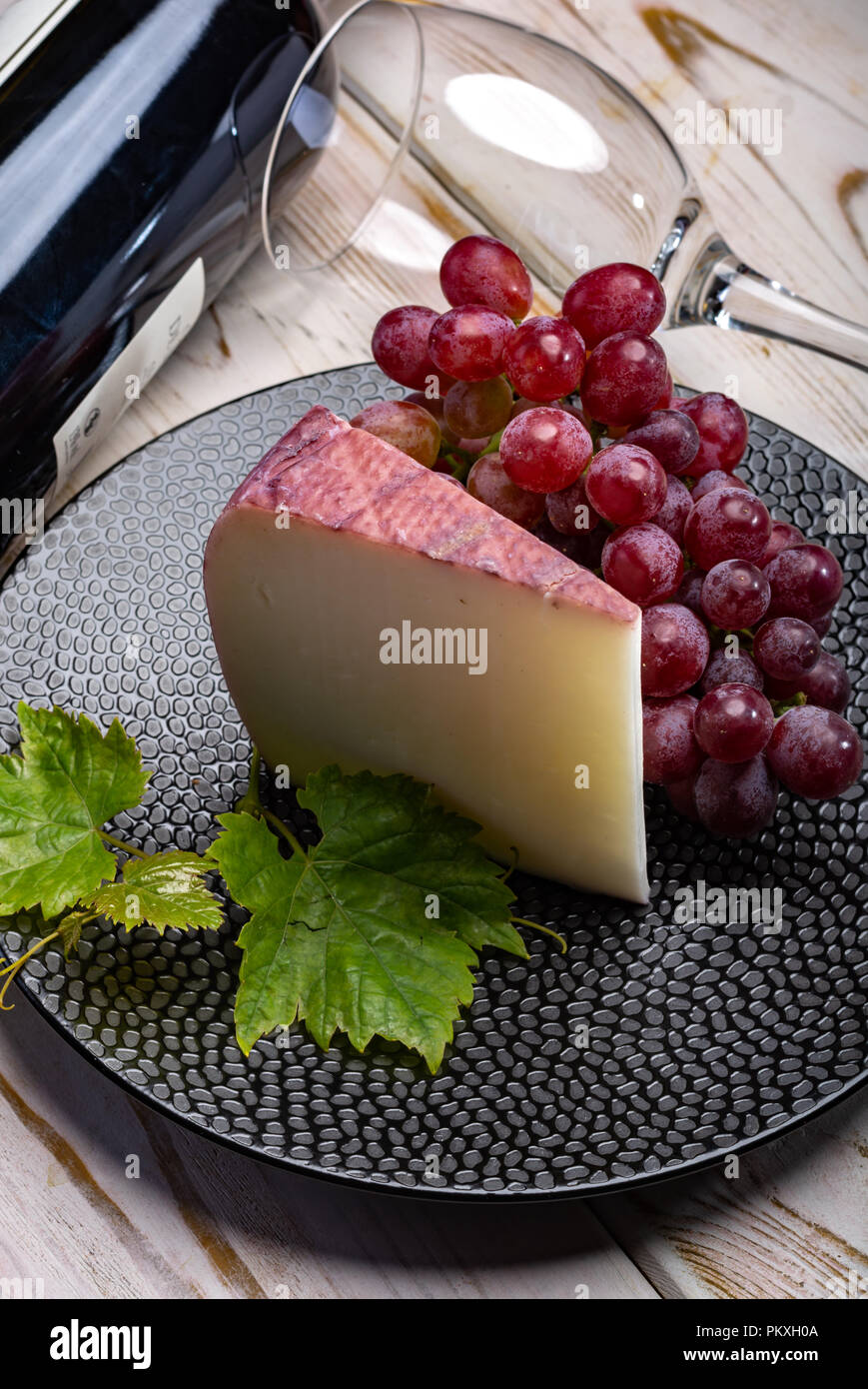 Traditional Spanish cheese, one piece of Murcian wine cheese from goat