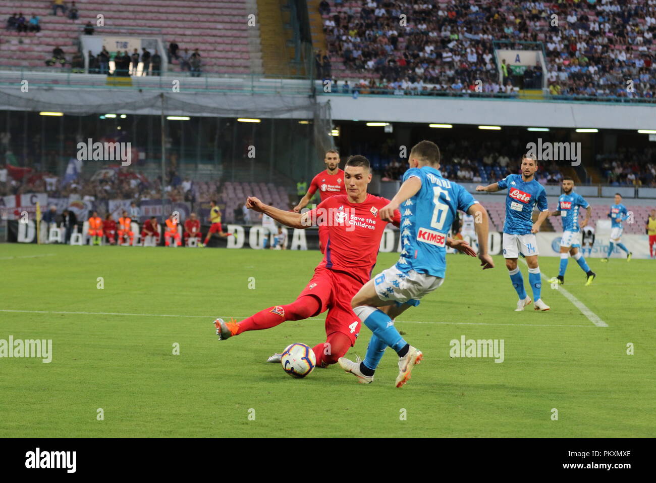 Naples, Italy. 15th September 2018. . In the picture: the Florentine player Milenkovic tries to take the ball off Mario Rui from Napoli.Stadium San Paolo Naples - 09/15/2018 - Italy.final result SSC Napoli 1 AC Fiorentina 0. Credit: Fabio Sasso/ZUMA Wire/Alamy Live News Stock Photo