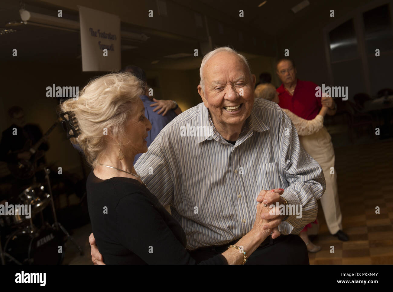 Marietta, GA, USA. 22nd June, 2018. Senior citizens known as 'The Foxtrotters' gather at county senior center for monthly dances to live music. 'It's important for seniors to get out and socialize to keeping loneliness at bay, ' notes club president Barbara Digulla. The club met every month for more than 20 years until county-mandated increases in fees caused the club to disband. Pictured:.Reuben Hernandez, 80 with Jackie Noonan Credit: Robin Rayne Nelson/ZUMA Wire/Alamy Live News Stock Photo