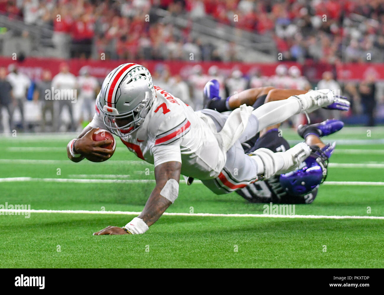 Texas, USA. 15th September 2018. September 15, 2018: Ohio State Buckeyes  quarterback Dwayne Haskins #7 scores on a 5 yard run as he dives across the  goal line in the fourth quarter