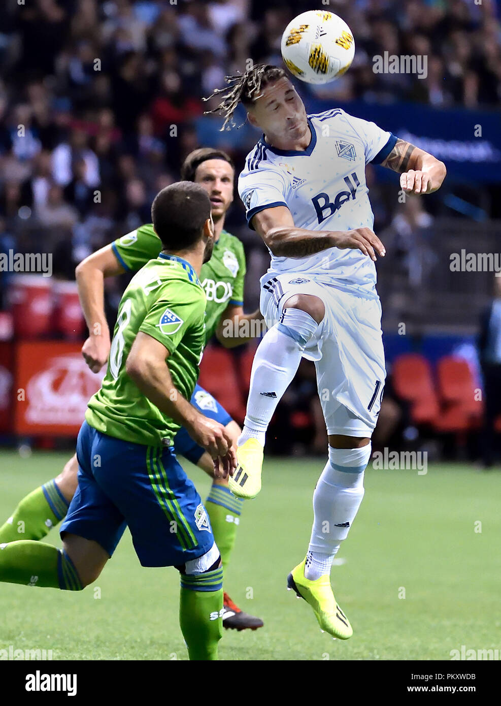 Vancouver, Canada. 15th Sep, 2018. Vancouver Whitecaps' Erik Hurtado (R) and Seattle Sounders' Raul Ruidiaz compete for the ball during a regular season play at BC Place in Vancouver, Sept. 15, 2018. Seattle Sounders won 2-1. Credit: Andrew Soong/Xinhua/Alamy Live News Stock Photo
