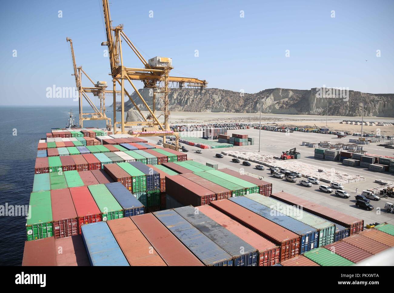 Beijing, China. 13th Nov, 2016. Photo taken on Nov. 13, 2016 shows the COSCO Wellington cargo vessel with containers is moored at Gwadar port, Pakistan. Credit: Liu Tian/Xinhua/Alamy Live News Stock Photo