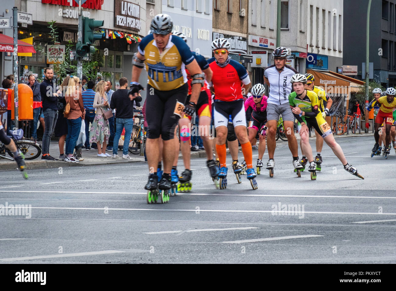 Berlin Germany, 15 September 2018. Annual Inline Skating Marathon. In line skaters pass through Rosenthaler Platz as they compete in the annual roller skating event. The event is the Grand Finale of the Inline skating season as skaters participants from 60 countries compete for the WORLD and GERMAN INLINE CUP Credit: Eden Breitz/Alamy Live News Stock Photo