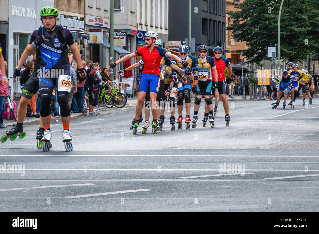 Berlin Germany, 15 September 2018. Annual Inline Skating Marathon. In line skaters pass through Rosenthaler Platz as they compete in the annual roller skating event. The event is the Grand Finale of the Inline skating season as skaters participants from 60 countries compete for the WORLD and GERMAN INLINE CUP Credit: Eden Breitz/Alamy Live News Stock Photo